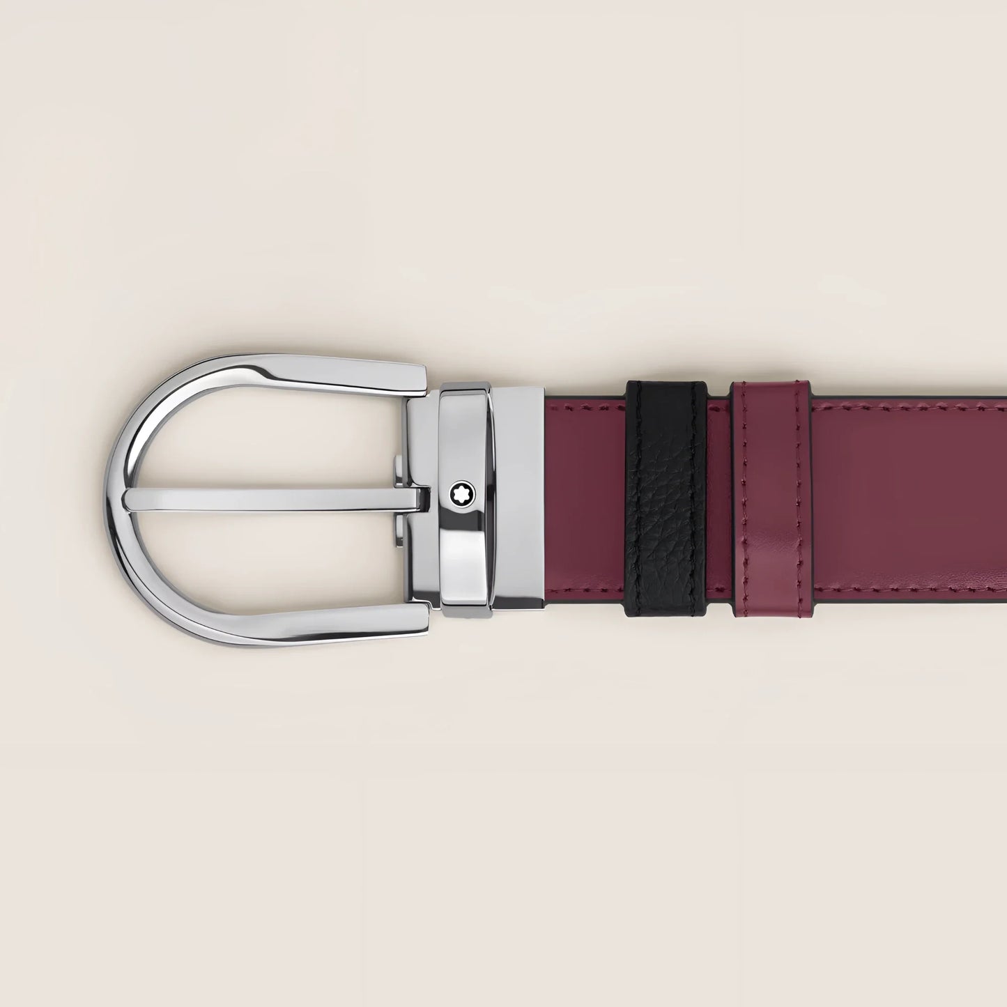 Cintura reversibile montblanc in pelle nera granulata con fibbia a ferro di cavallo in metallo lucido burdeos