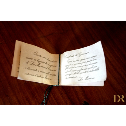 Piccolo opuscolo con testo scritto a mano, design italiano e vetro soffiato per casa