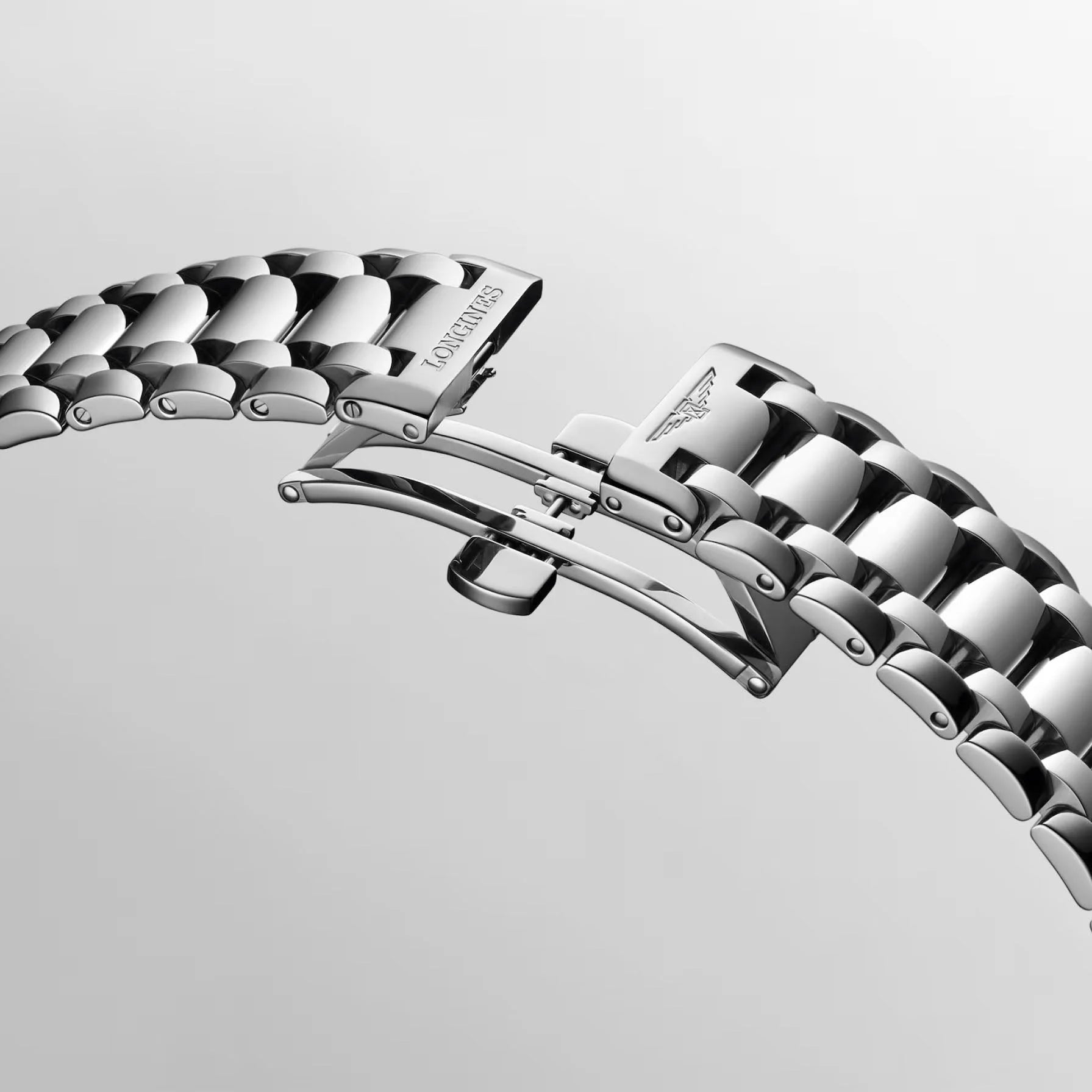 Bracciale in acciaio inox lucido con design a maglie classico e logo longines inciso per orologio primaluna