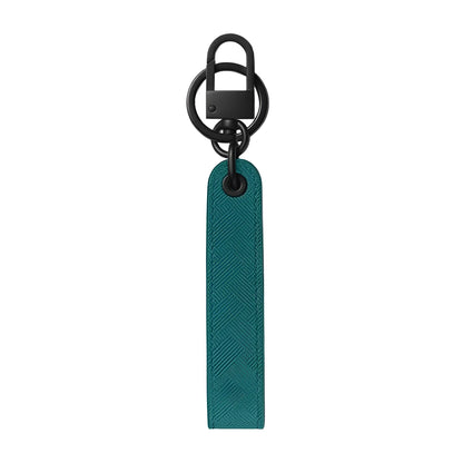Portachiavi montblanc extreme 3.0 in pelle teal con motivo a spina di pesce e hardware metallico nero fern blue