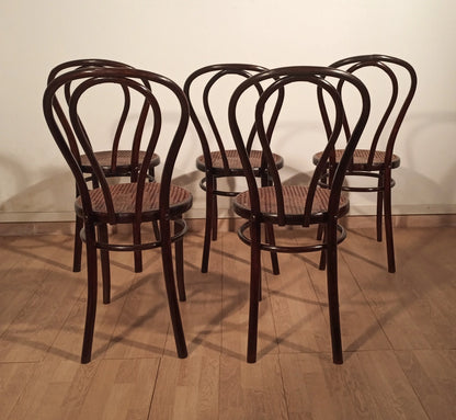 Set di quattro sedie stile thonet drava con sedute in paglia intrecciata e struttura in legno curvato nero
