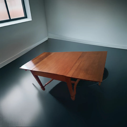 Antico ed elegante tavolo decò vintage in ciliegio massello allungabile con piano a libro in legno